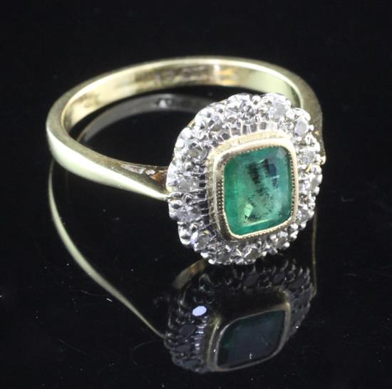 A 1950s? 18ct gold, emerald and diamond cluster ring, size Q.